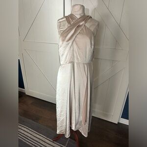 Brand new with tags from Macy’s beautiful size 8 halter cream colored dress!